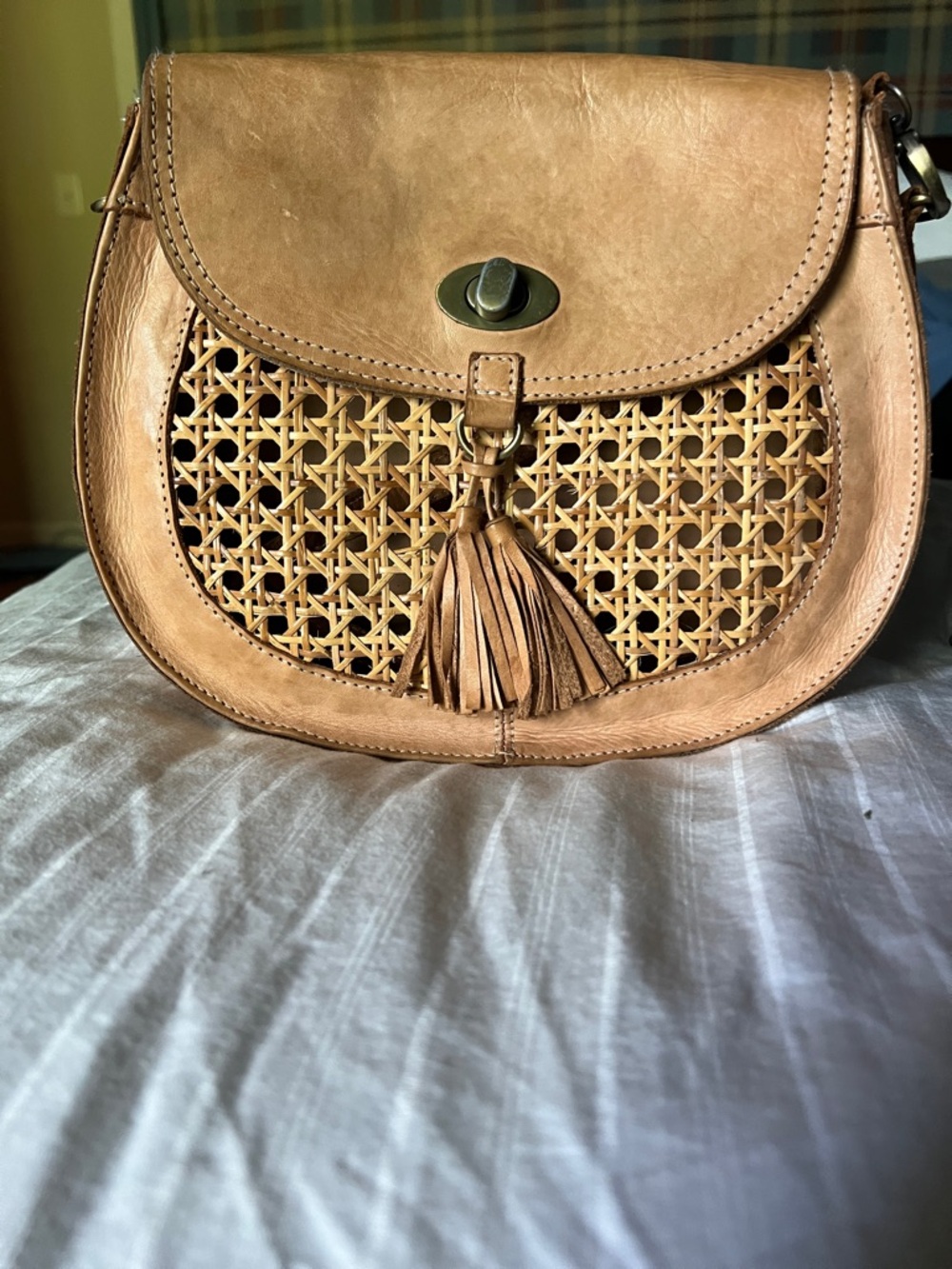 Leather cross body with caned detail